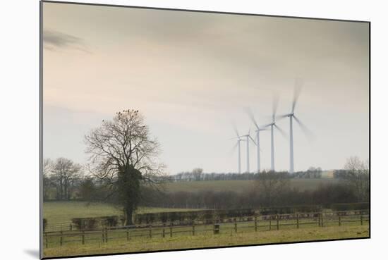 Wind Turbine a Row of Wind Turbines Producing Green Energy-null-Mounted Photographic Print