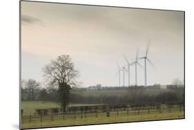 Wind Turbine a Row of Wind Turbines Producing Green Energy-null-Mounted Photographic Print