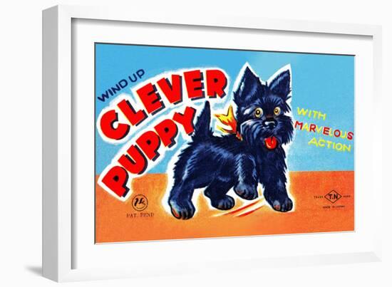 Wind Up Clever Puppy-null-Framed Art Print