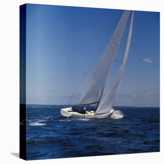 Windblown Sails of Yacht on Open Sea-null-Stretched Canvas
