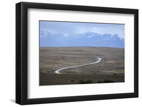 Winding desert road and Andes mountains, El Calafate, Parque Nacional Los Glaciares, UNESCO World H-Stuart Black-Framed Photographic Print