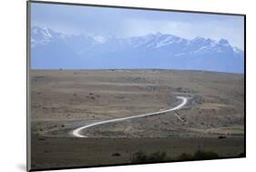 Winding desert road and Andes mountains, El Calafate, Parque Nacional Los Glaciares, UNESCO World H-Stuart Black-Mounted Photographic Print