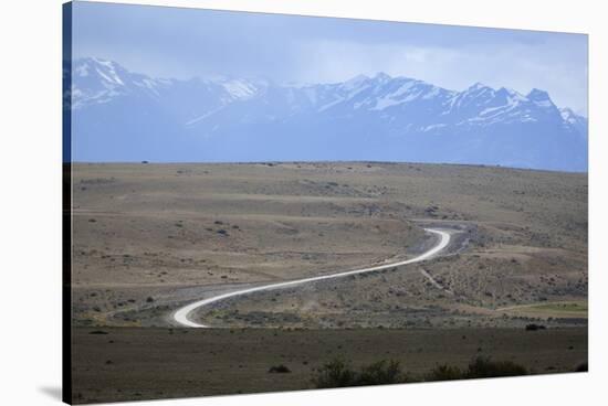 Winding desert road and Andes mountains, El Calafate, Parque Nacional Los Glaciares, UNESCO World H-Stuart Black-Stretched Canvas