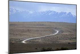 Winding desert road and Andes mountains, El Calafate, Parque Nacional Los Glaciares, UNESCO World H-Stuart Black-Mounted Photographic Print