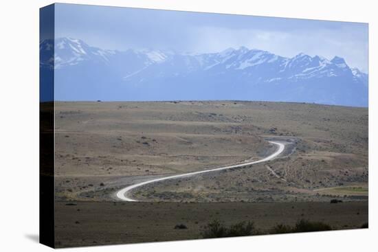 Winding desert road and Andes mountains, El Calafate, Parque Nacional Los Glaciares, UNESCO World H-Stuart Black-Stretched Canvas