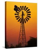 Windmill at Sunset, Fitzroy Crossing, Kimberley Region, Western Australia, Australia-David Wall-Stretched Canvas