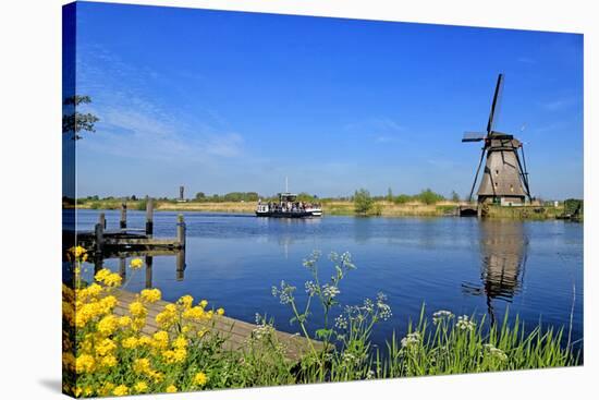 Windmill in Kinderdijk, UNESCO World Heritage Site, South Holland, Netherlands, Europe-Hans-Peter Merten-Stretched Canvas