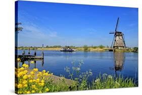 Windmill in Kinderdijk, UNESCO World Heritage Site, South Holland, Netherlands, Europe-Hans-Peter Merten-Stretched Canvas