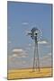 Windmill in wheat field Eastern Washington-Darrell Gulin-Mounted Photographic Print