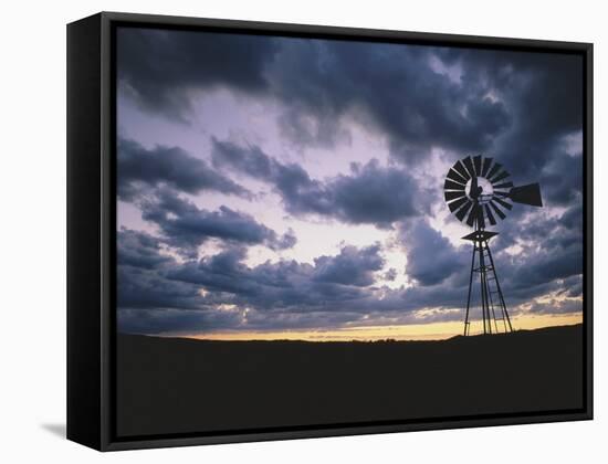 Windmill Silhouette under Broken Clouds-James Randklev-Framed Stretched Canvas