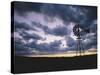 Windmill Silhouette under Broken Clouds-James Randklev-Stretched Canvas