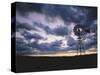 Windmill Silhouette under Broken Clouds-James Randklev-Stretched Canvas