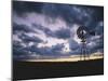 Windmill Silhouette under Broken Clouds-James Randklev-Mounted Photographic Print