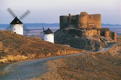 https://imgc.allpostersimages.com/img/posters/windmills-along-road-of-don-quixote-at-consuegra-with-la-muela-castle-in-background_u-L-PV1A0A0.jpg?artPerspective=n