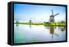 Windmills and Canal in Kinderdijk, Holland or Netherlands. Unesco Site-stevanzz-Framed Stretched Canvas