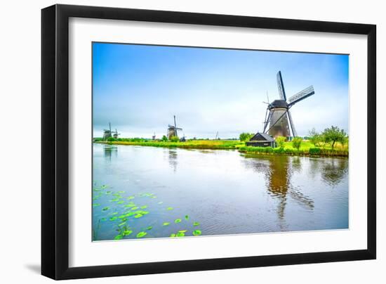 Windmills and Canal in Kinderdijk, Holland or Netherlands. Unesco Site-stevanzz-Framed Photographic Print