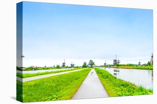 Windmills and Canals in Kinderdijk, Holland or Netherlands. Unesco Site-stevanzz-Stretched Canvas