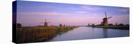 Windmills at Kinderdijk, Zuid, Holland-Walter Bibikow-Stretched Canvas