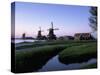 Windmills at Sunset, Zaanstad, North Holland-Walter Bibikow-Stretched Canvas