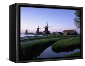 Windmills at Sunset, Zaanstad, North Holland-Walter Bibikow-Framed Stretched Canvas