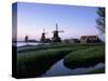 Windmills at Sunset, Zaanstad, North Holland-Walter Bibikow-Stretched Canvas