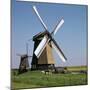 Windmills in Holland-CM Dixon-Mounted Photographic Print