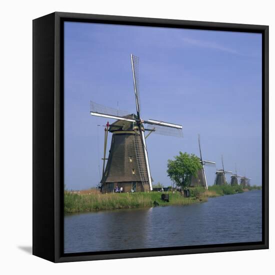 Windmills on the Canal at Kinderdijk Near Rotterdam, UNESCO World Heritage Site, the Netherlands-Roy Rainford-Framed Stretched Canvas