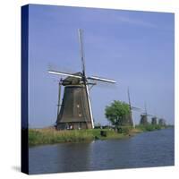 Windmills on the Canal at Kinderdijk Near Rotterdam, UNESCO World Heritage Site, the Netherlands-Roy Rainford-Stretched Canvas