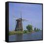 Windmills on the Canal at Kinderdijk Near Rotterdam, UNESCO World Heritage Site, the Netherlands-Roy Rainford-Framed Stretched Canvas