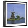 Windmills on the Canal at Kinderdijk Near Rotterdam, UNESCO World Heritage Site, the Netherlands-Roy Rainford-Framed Photographic Print