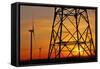 Windmills, pylon and power lines in morning light, Germany, Europe-Hans-Peter Merten-Framed Stretched Canvas