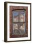 Window in a rowhouse in Wislica, Poland with reflections from the home across the street.-Mallorie Ostrowitz-Framed Photographic Print