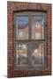 Window in a rowhouse in Wislica, Poland with reflections from the home across the street.-Mallorie Ostrowitz-Mounted Photographic Print