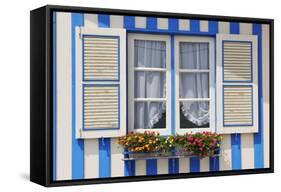 Window of a Traditional Striped Painted House in the Little Seaside Village of Costa Nova, Portugal-Mauricio Abreu-Framed Stretched Canvas