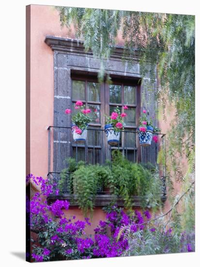 Window with Geraniums, San Miguel De Allende, Mexico-Alice Garland-Stretched Canvas