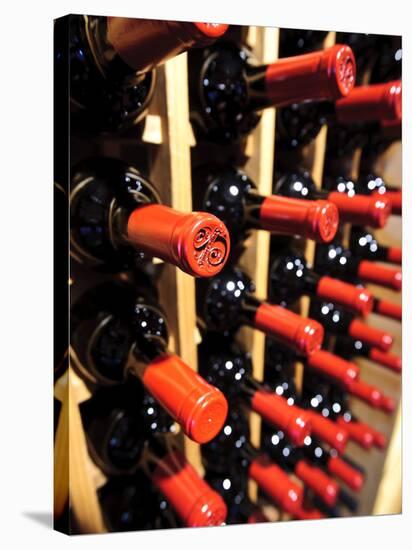 Wine Bottles in a Rack, Temecula, California, USA-Richard Duval-Stretched Canvas