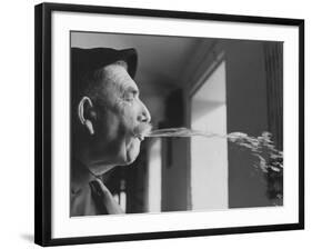 Wine Cellar Master and Taster Spitting Wine-Carlo Bavagnoli-Framed Photographic Print