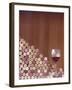 Wine Corks, Piled Up, and a Glass of Red Wine-Henrik Freek-Framed Photographic Print