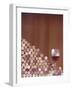 Wine Corks, Piled Up, and a Glass of Red Wine-Henrik Freek-Framed Photographic Print