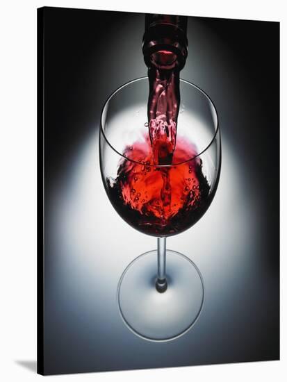 Wine poured in glass-Newmann-Stretched Canvas