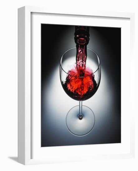 Wine poured in glass-Newmann-Framed Photographic Print