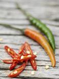 Chili Peppers, Whole and Sliced-Winfried Heinze-Laminated Photographic Print