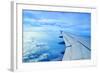 Wing of an Airplane Flying Above the Clouds-ghoststone-Framed Photographic Print