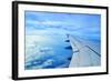 Wing of an Airplane Flying Above the Clouds-ghoststone-Framed Photographic Print