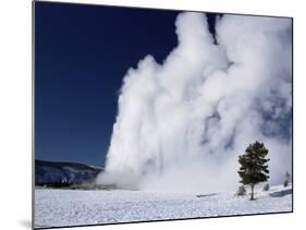 Winter Eruption, Old Faithful Geyser, Yellowstone National Park, Wyoming-Tony Waltham-Mounted Photographic Print