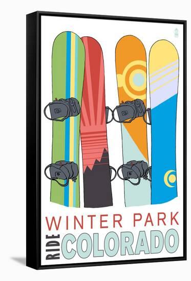 Winter Park, Colorado - Snowboards in Snow-Lantern Press-Framed Stretched Canvas