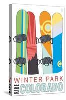 Winter Park, Colorado - Snowboards in Snow-Lantern Press-Stretched Canvas