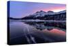 Winter sunrise on snowcapped mountains mirrored in the icy Lake Silvaplana, Maloja-Roberto Moiola-Stretched Canvas