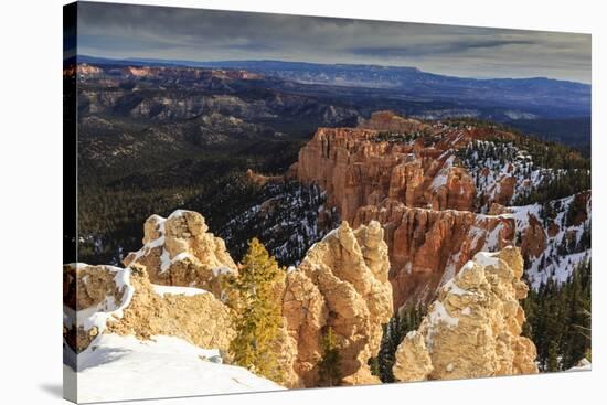 Wintry Cliffs and Hoodoos Strongly Lit by Morning Sun with Cloudy Backdrop-Eleanor Scriven-Stretched Canvas