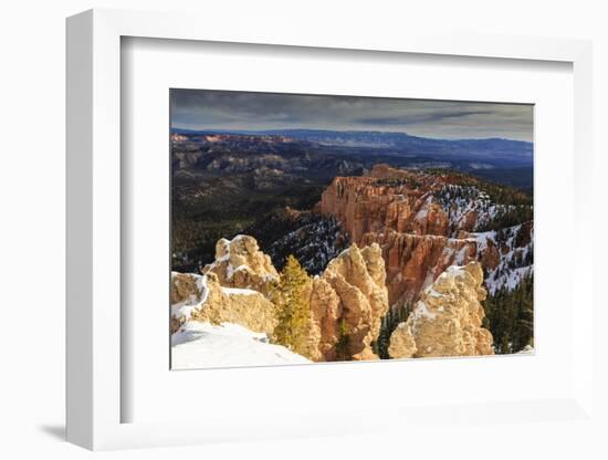 Wintry Cliffs and Hoodoos Strongly Lit by Morning Sun with Cloudy Backdrop-Eleanor Scriven-Framed Photographic Print